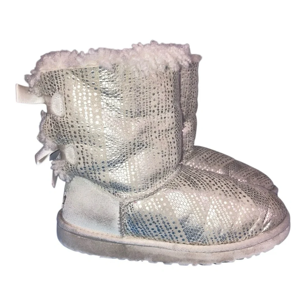 UGG Bailey Bow Bling boots in a light color boots are adorned with silky bows